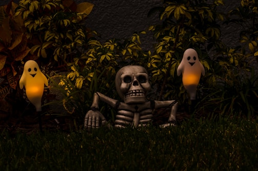 A spooky Halloween setup with eerie decorations and fog.