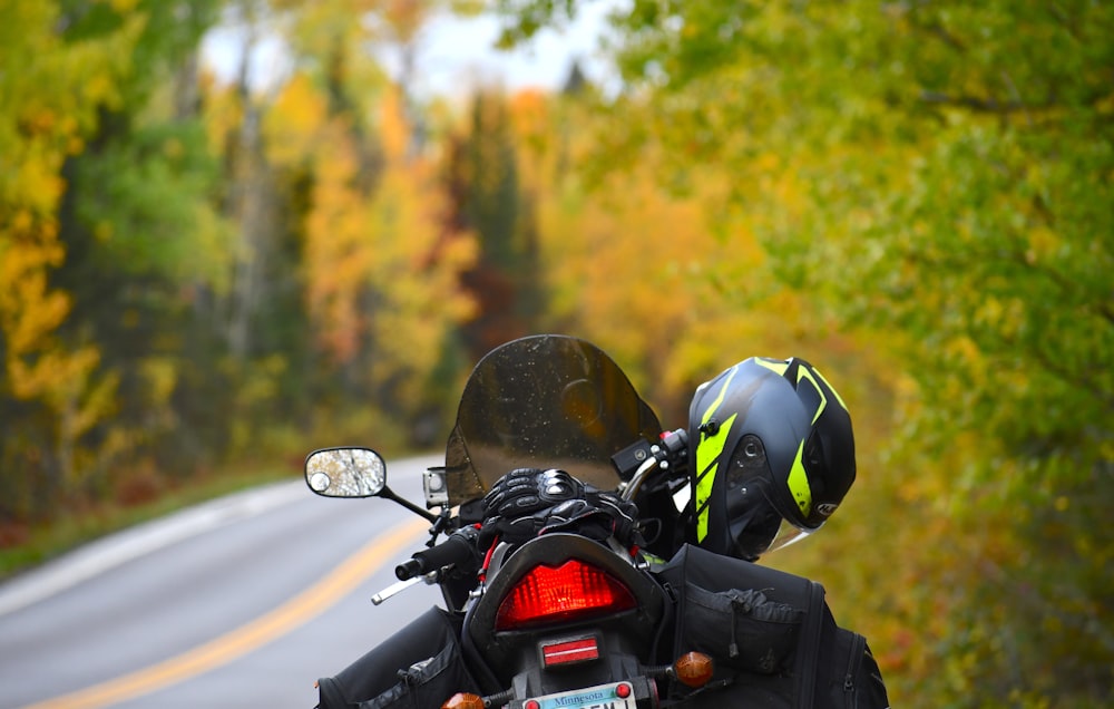 a motorcycle is parked on the side of the road