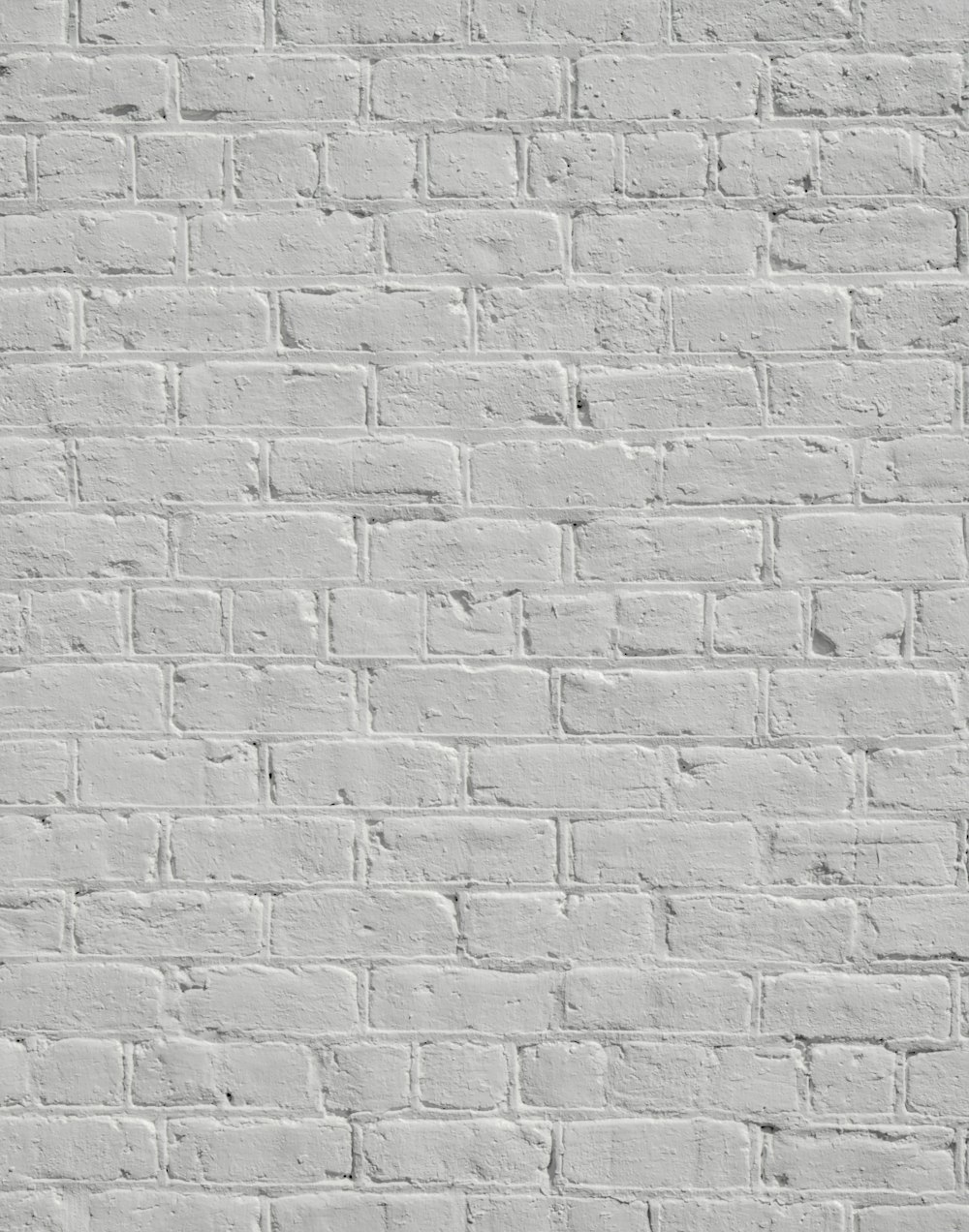 eine weiße Ziegelmauer ohne Mörtel oder Mörtel