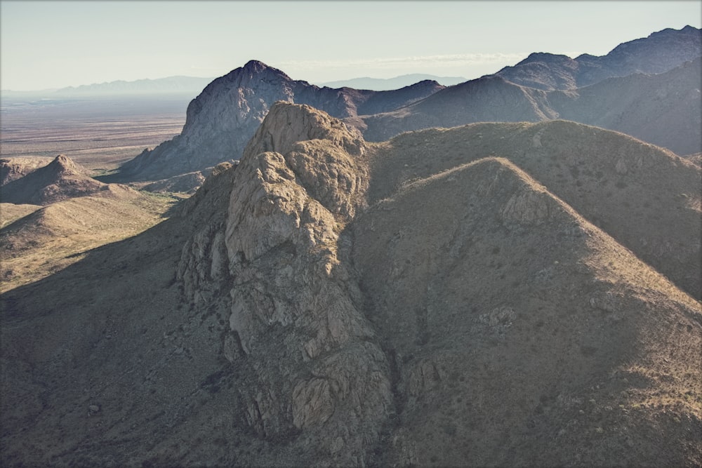 a view of a mountain range in the desert