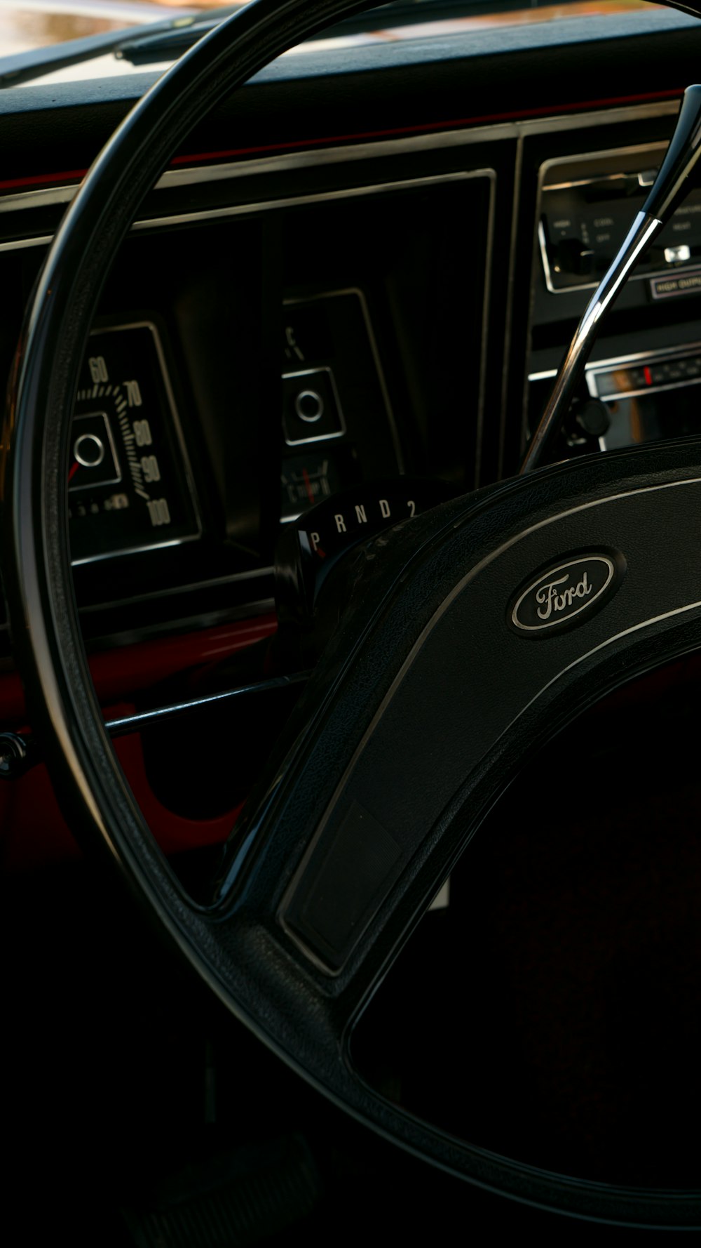 a steering wheel and dashboard of a car