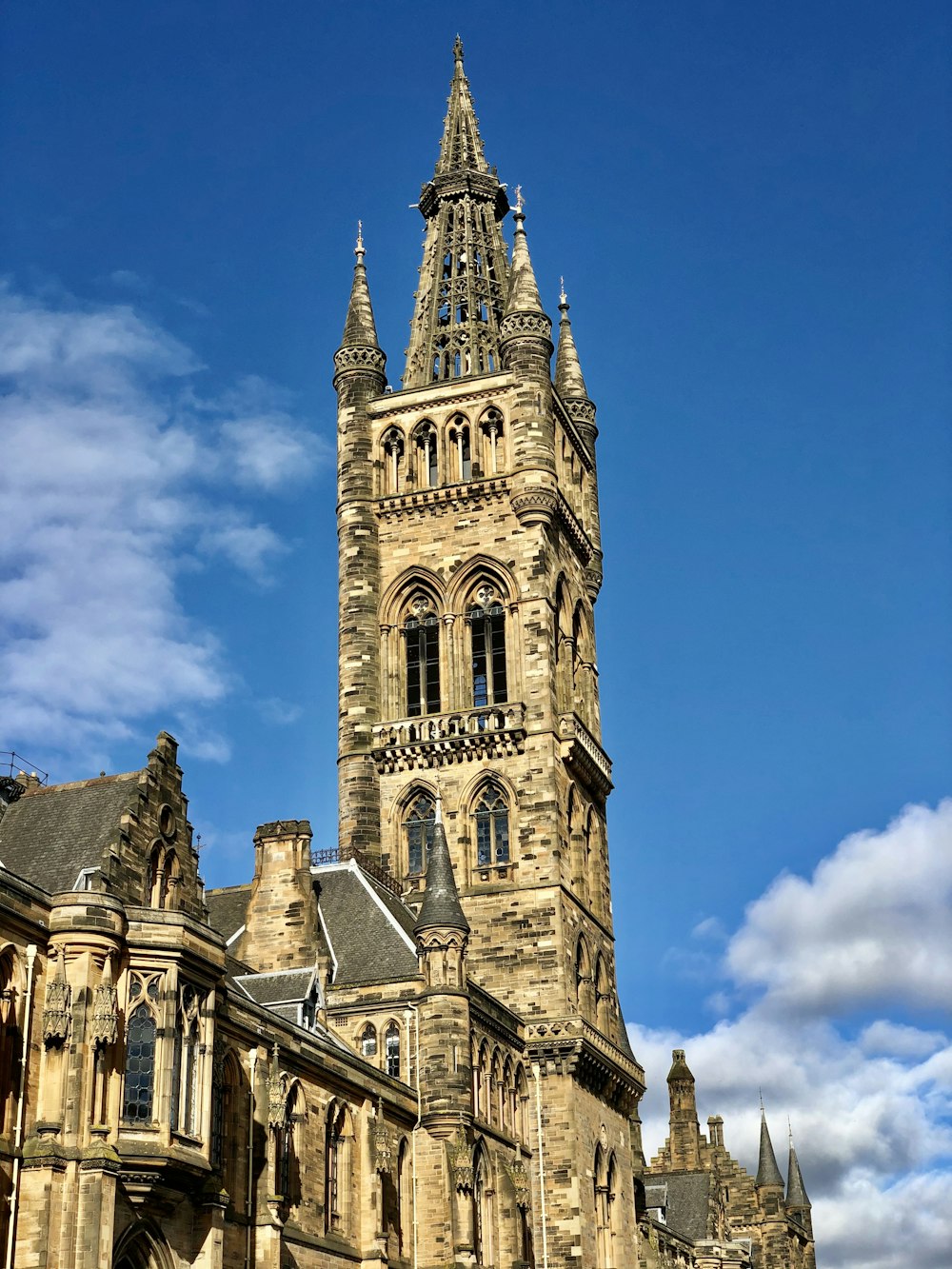 a tall tower with a clock on the top of it