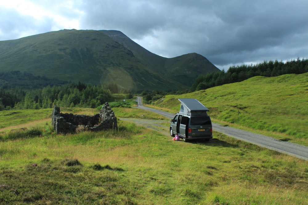 a van parked on the side of a road