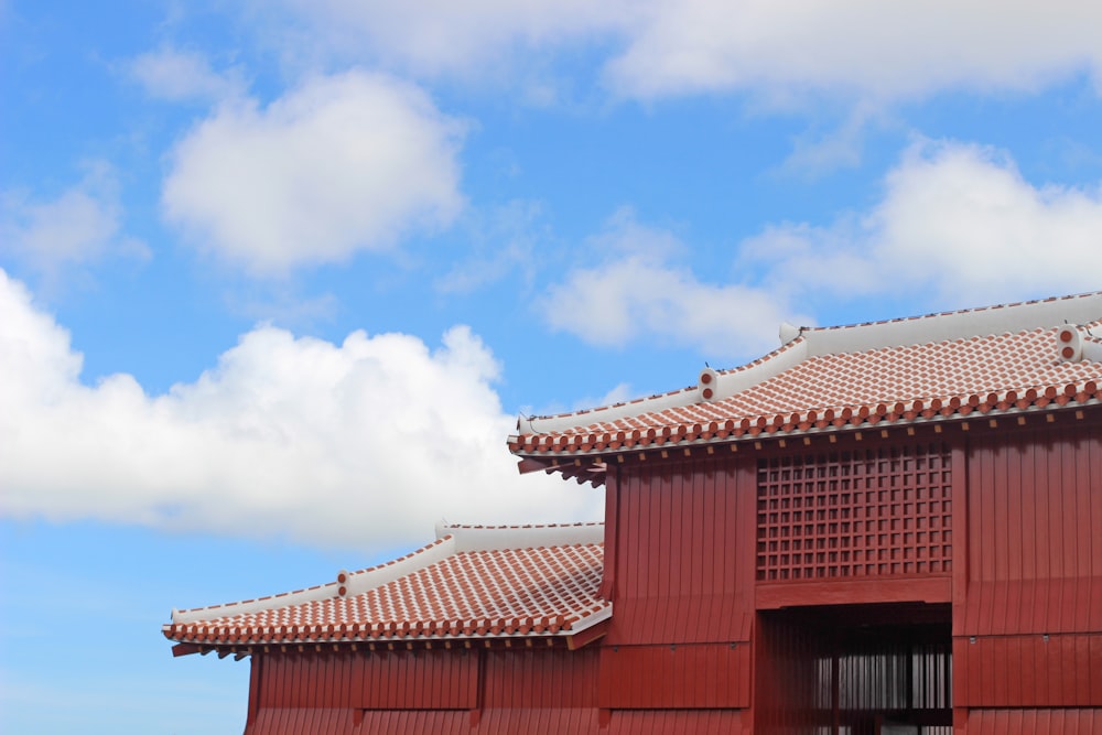 a red building with a sky background