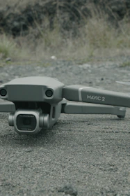 DJI Matrice 300 RTK drone equipped with Zenmuse L1 LiDAR scanning a landscape.