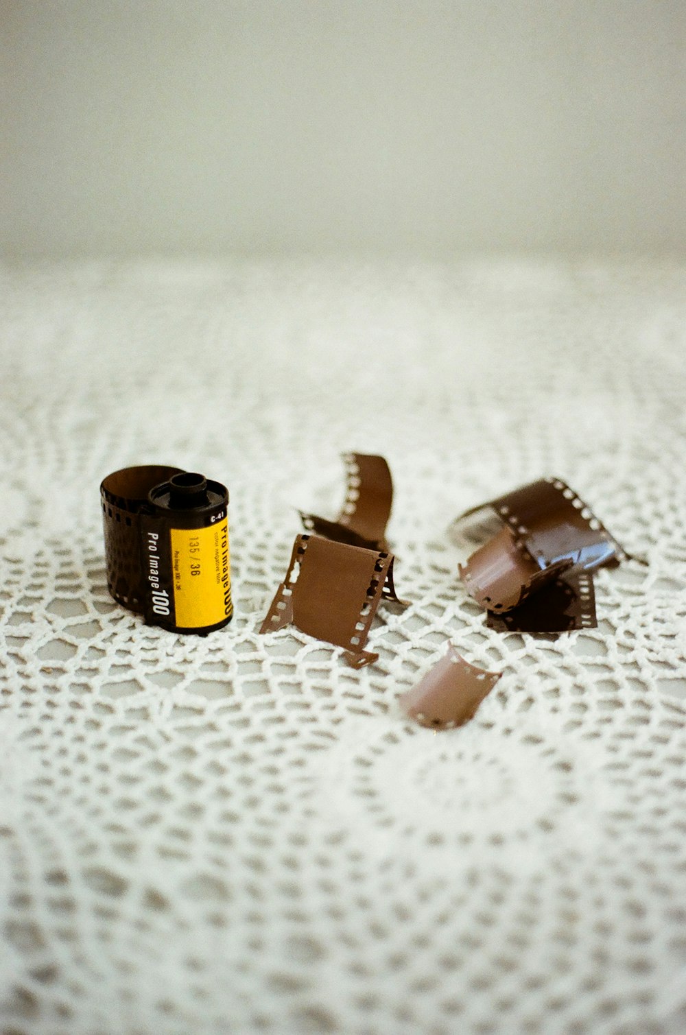 a couple of pieces of film sitting on top of a table