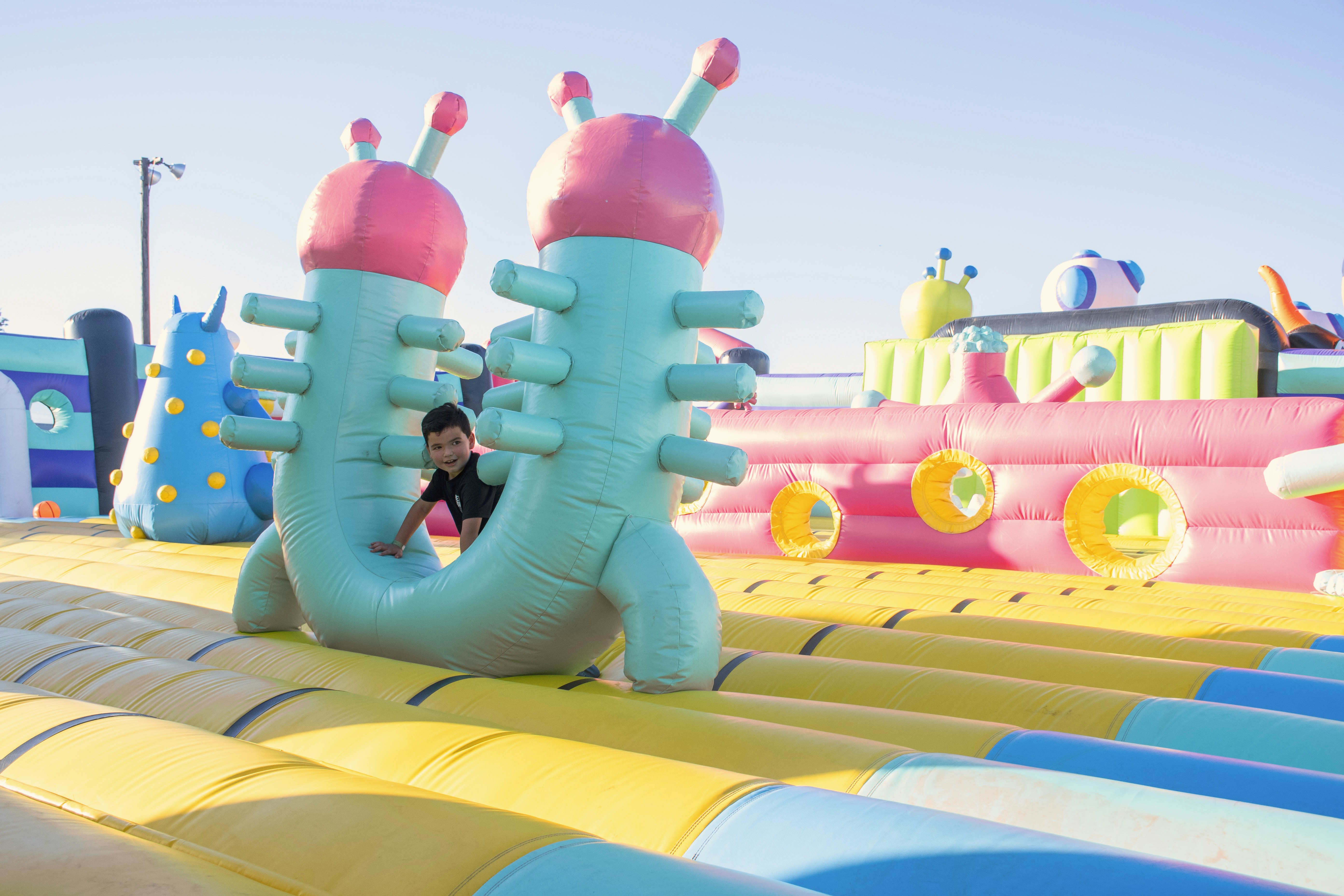 a person standing on top of an inflatable structure