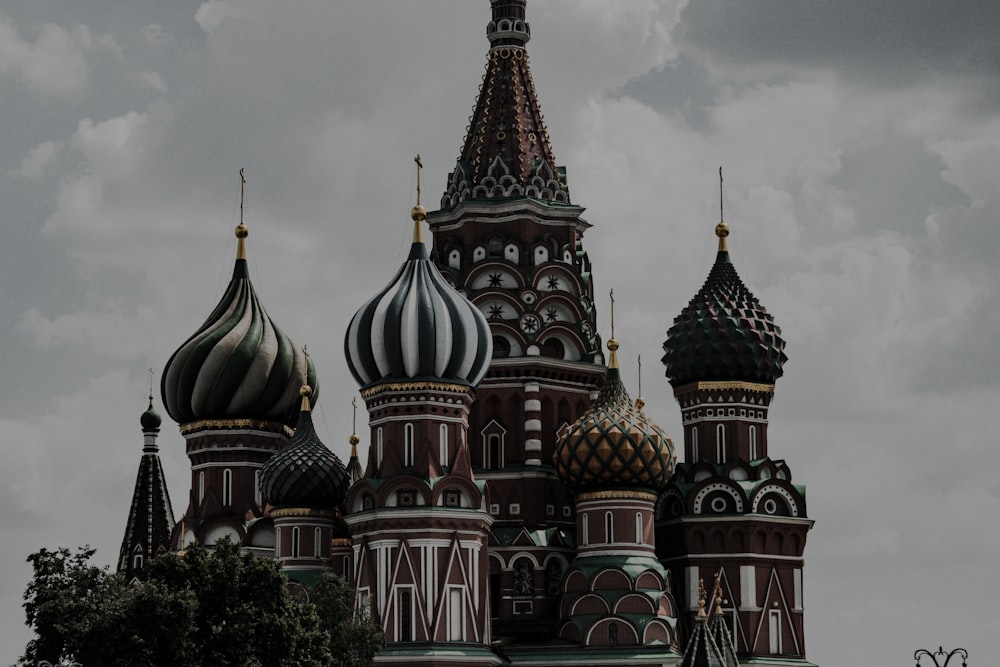 a very tall building with a clock on it's side