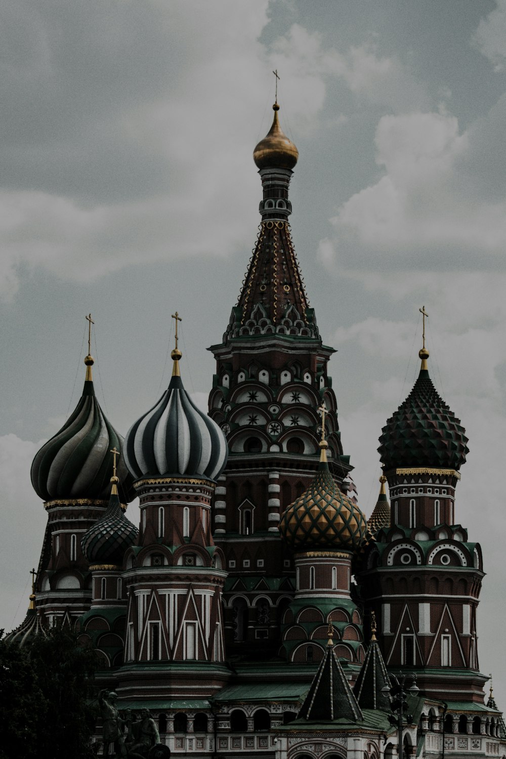 a very tall building with a clock on it's side