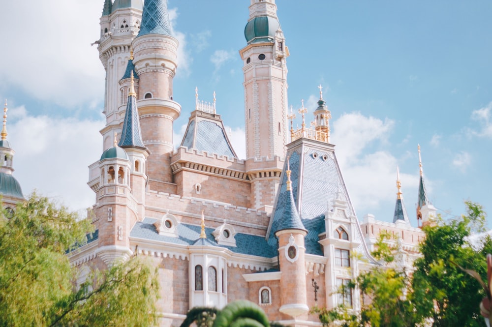 a large castle with a clock on the top of it