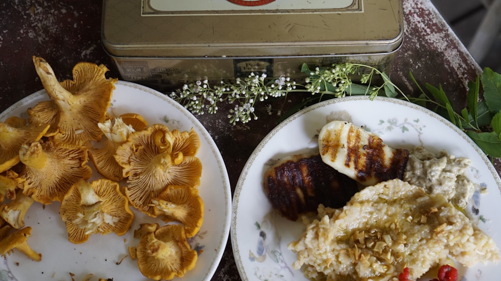 a couple of plates of food on a table