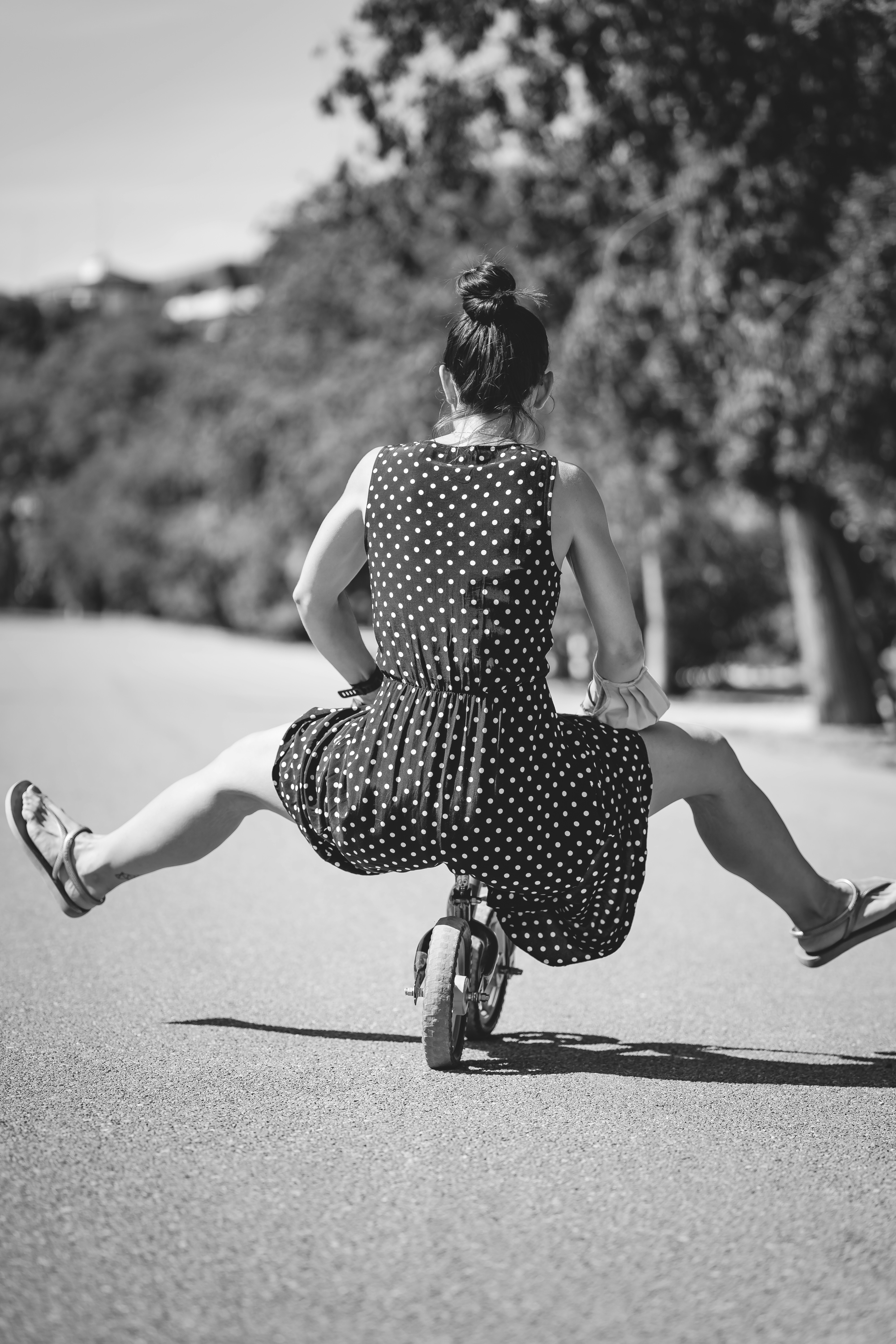 Woman on small bicycle