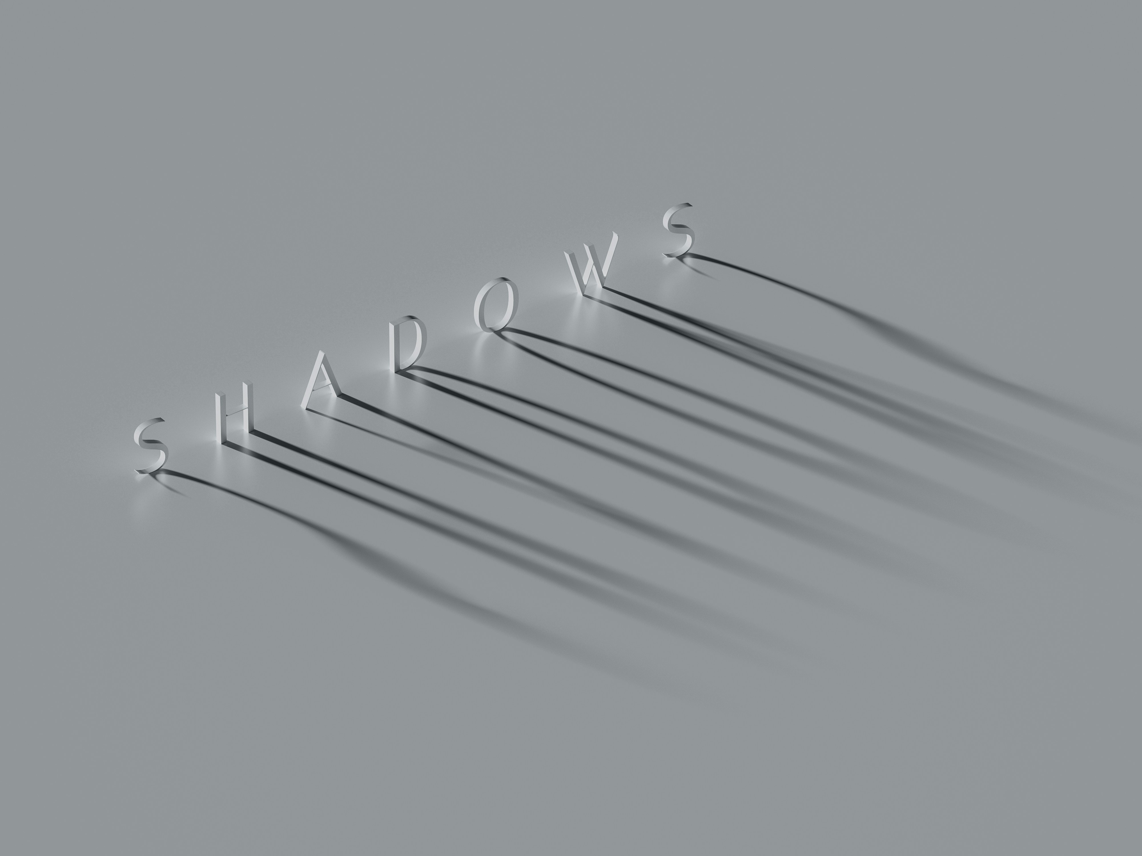 a group of shadows on a gray surface
