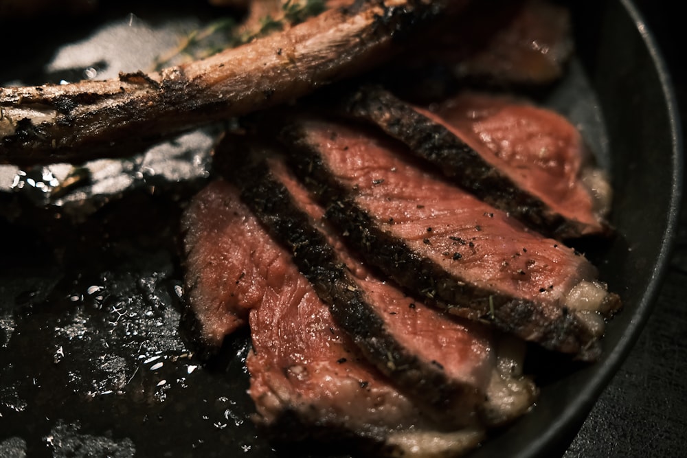 a close up of a plate of food with meat