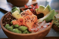 a close up of a bowl of food on a table