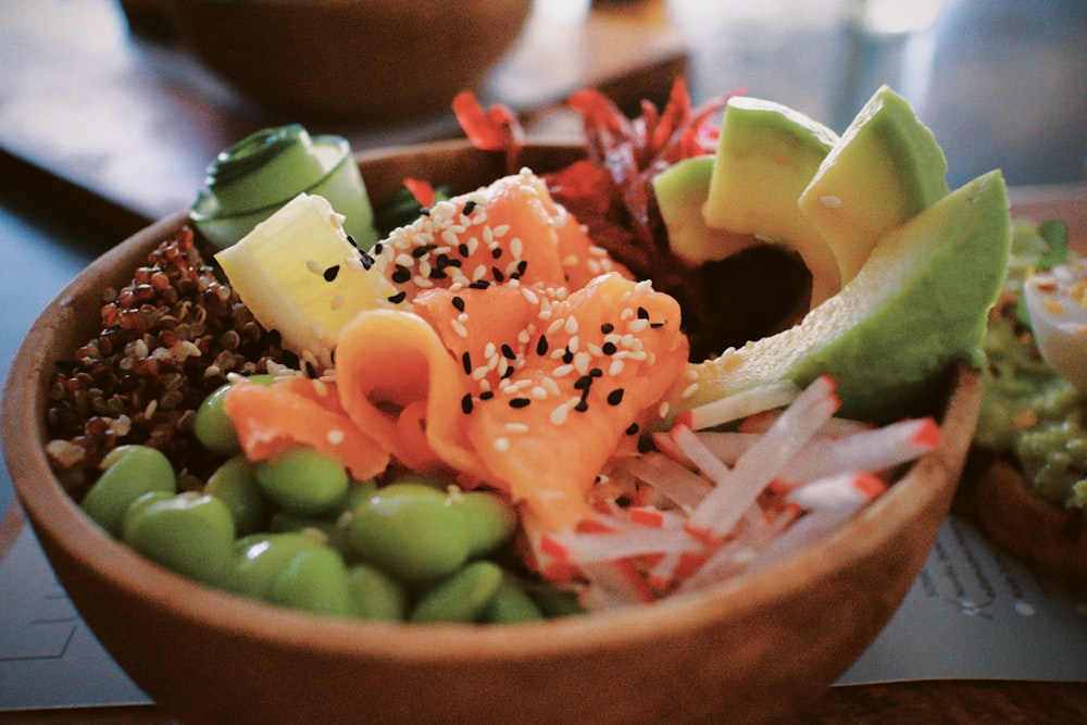 a close up of a bowl of food on a table