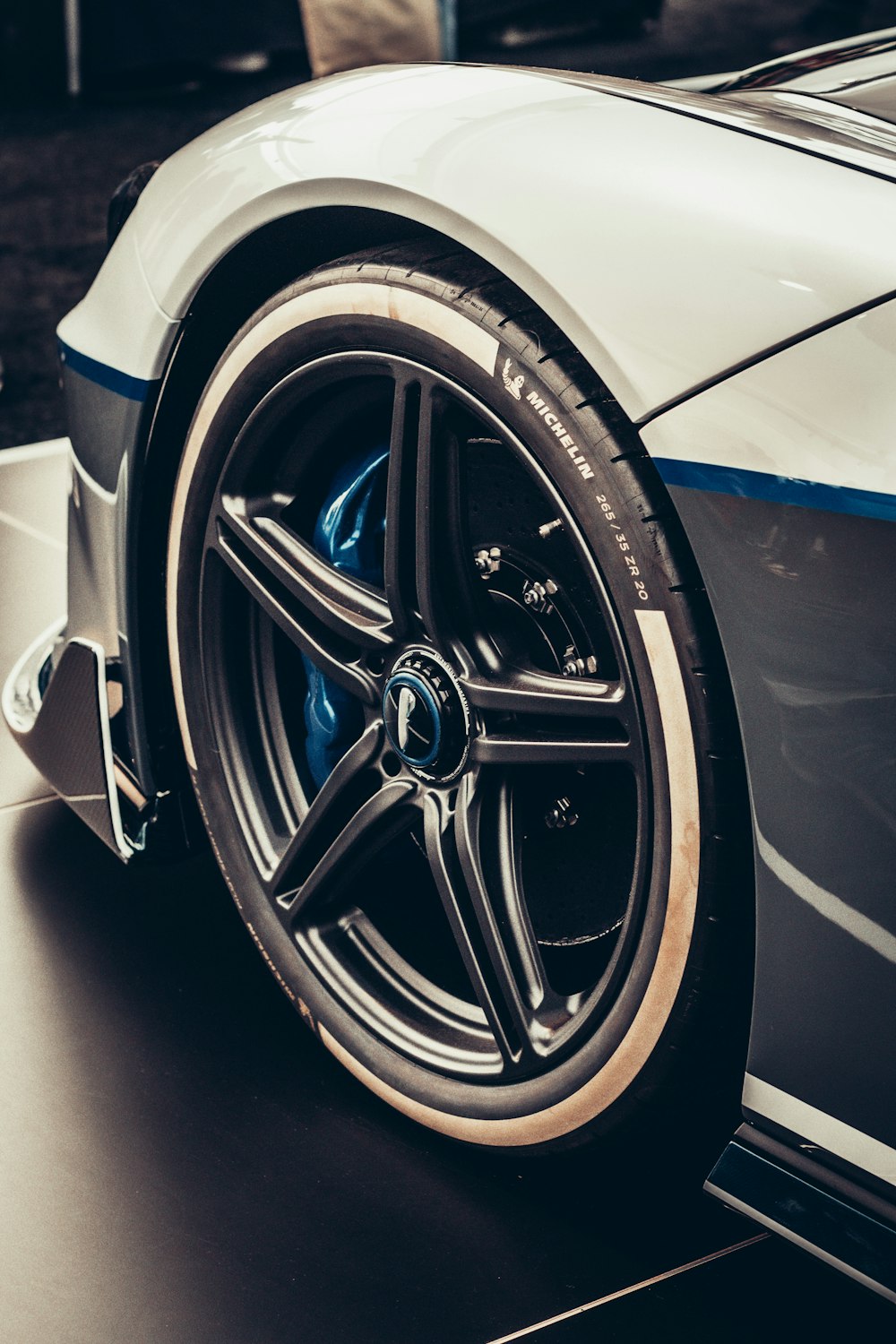 a close up of a sports car tire