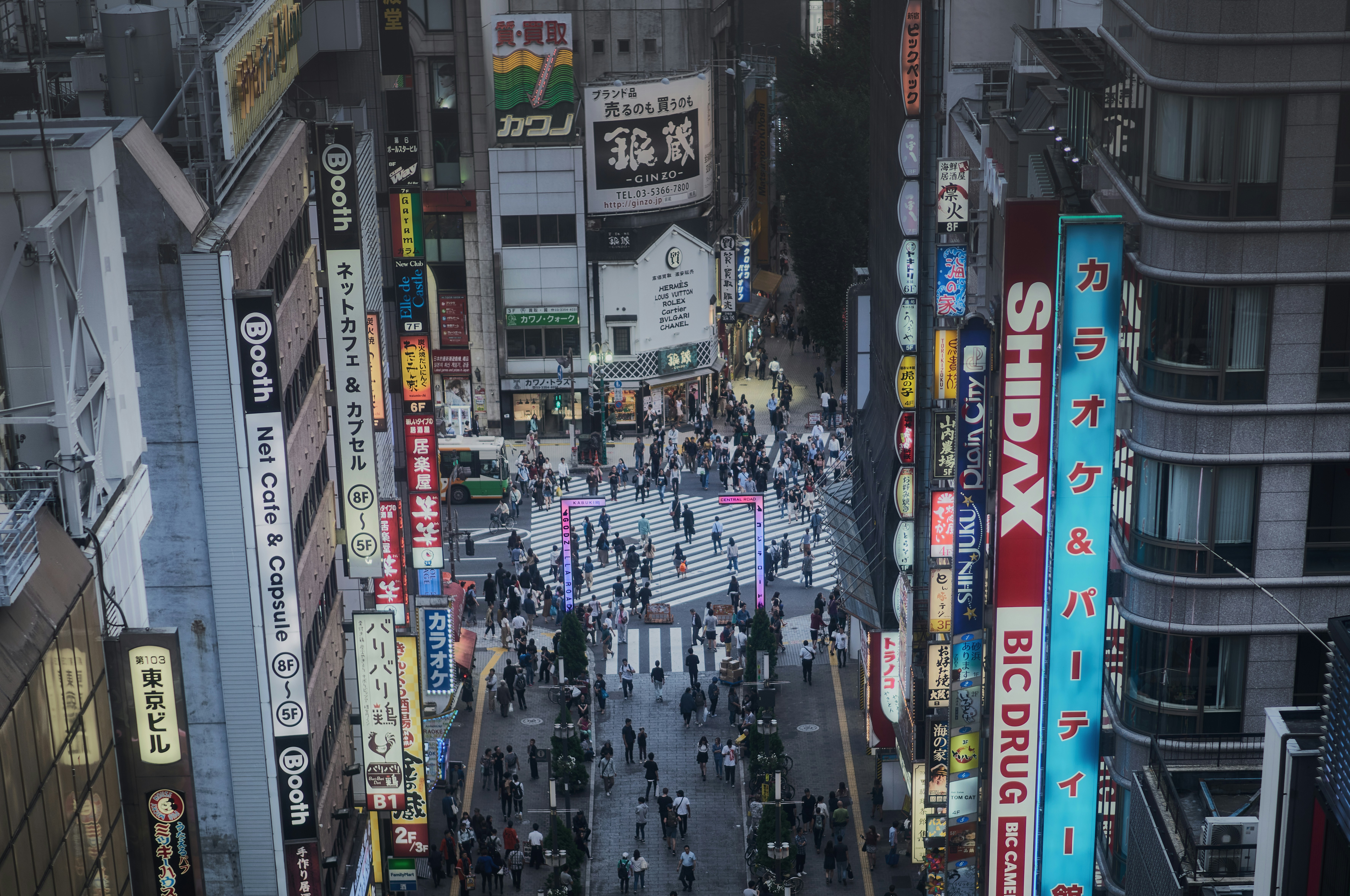 a city street filled with lots of tall buildings