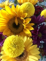 A colorful seasonal bouquet featuring sunflowers, daisies, and wildflowers bursting with natural charm.