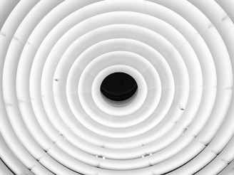 a black and white photo of a circular object