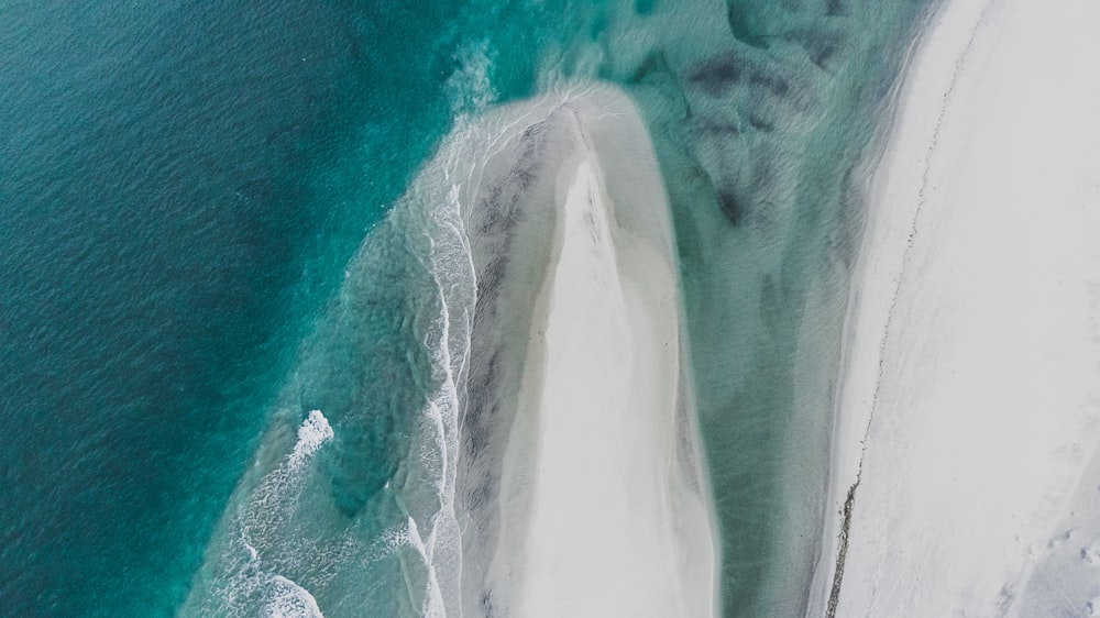 an aerial view of a beach and the ocean