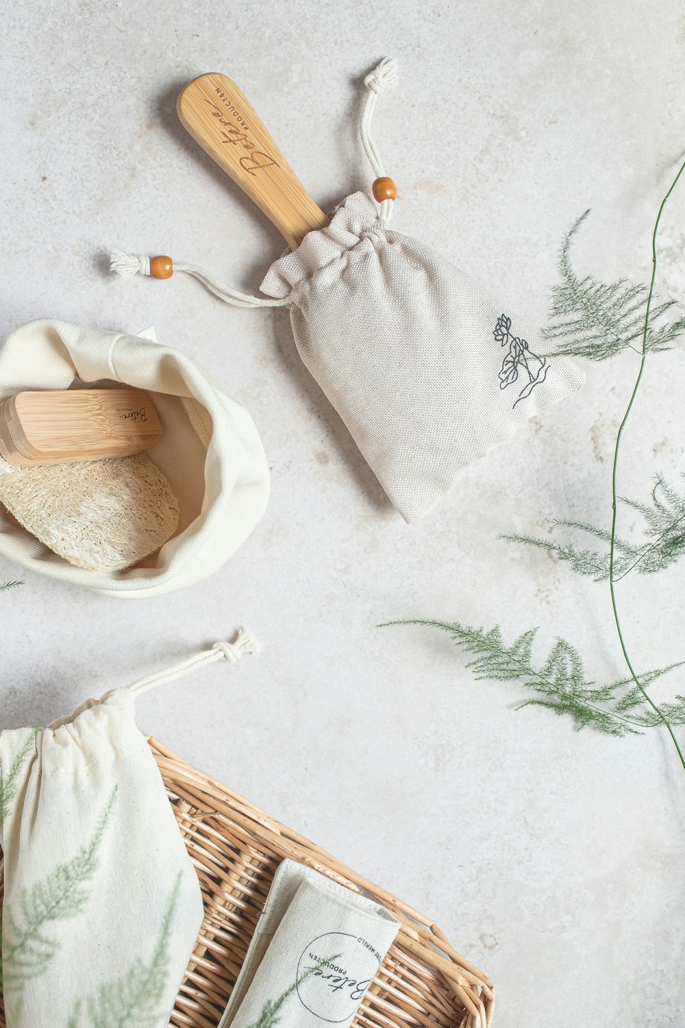 a wooden spoon sitting on top of a table next to a bag