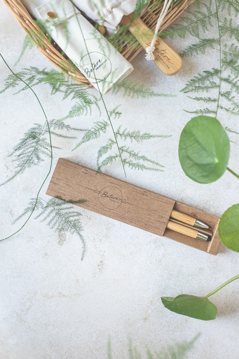 a couple of wooden pens sitting on top of a table