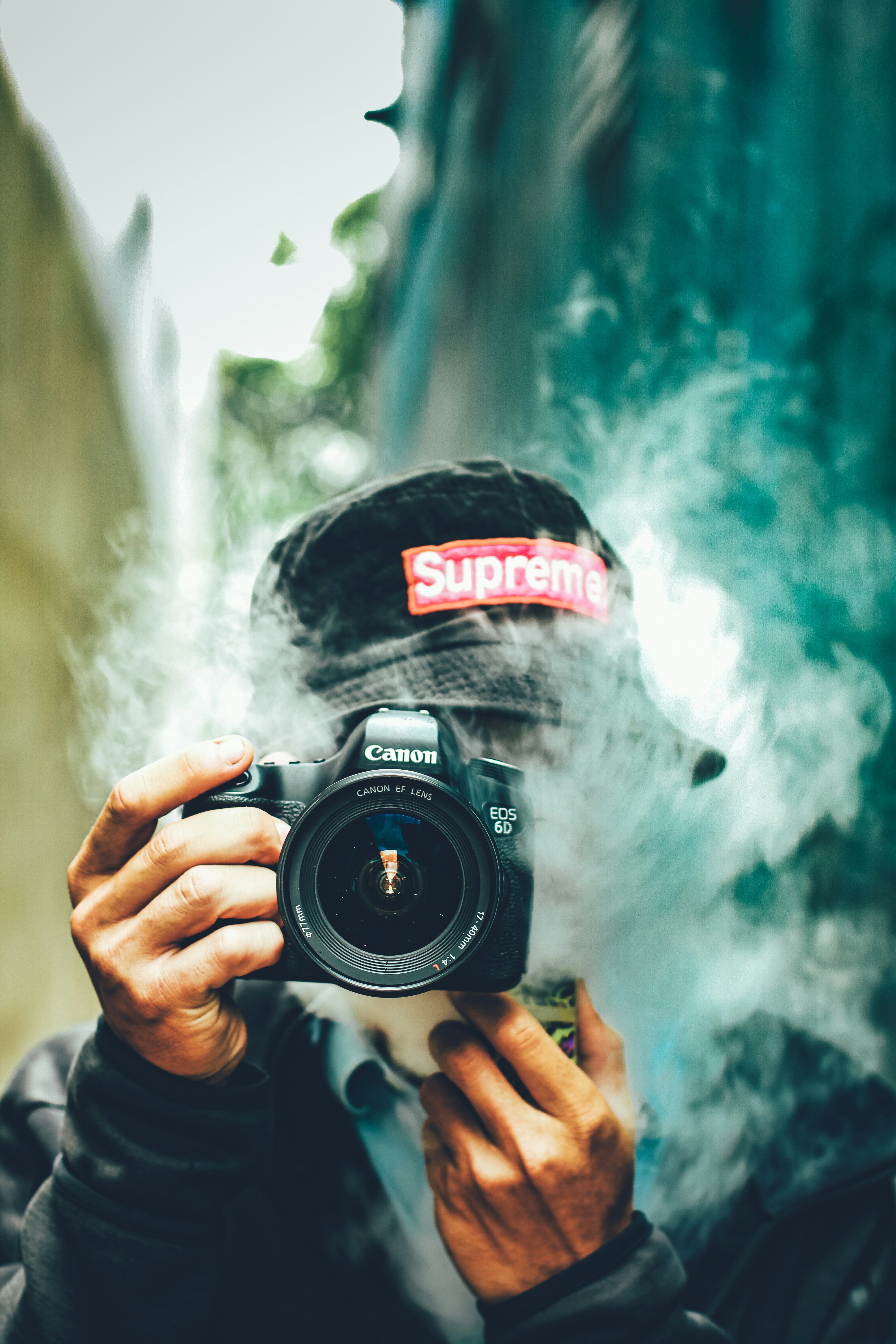 a man taking a picture of himself with a camera