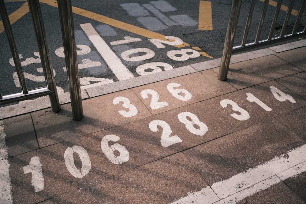 a parking lot with numbers painted on the ground