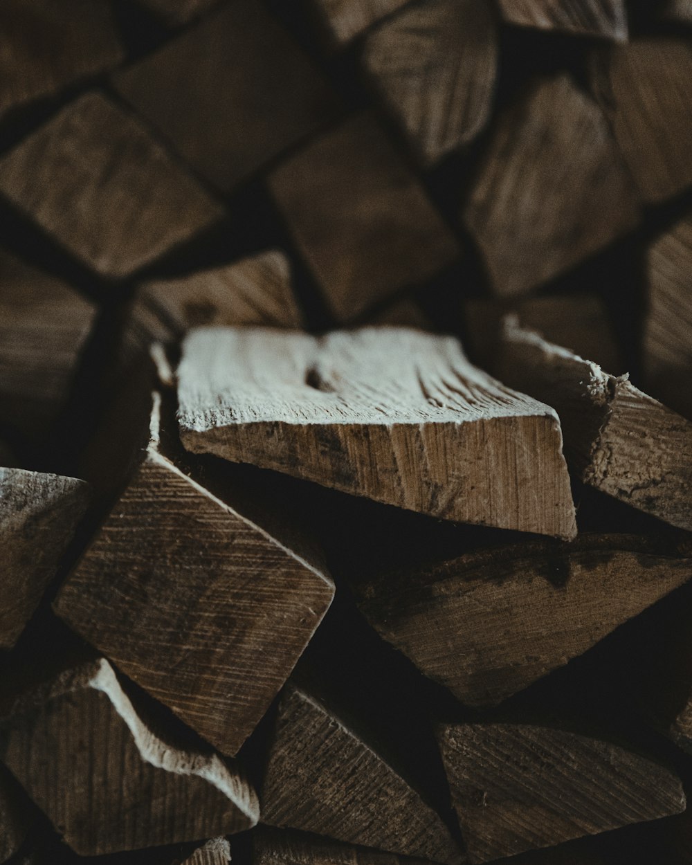 a pile of wood that has been cut into pieces