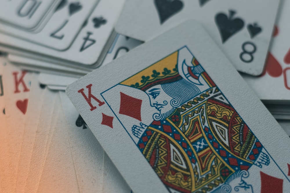 a pile of playing cards sitting on top of each other