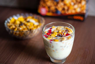 a bowl of cereal and a glass of milk