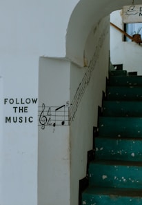 a set of stairs with a musical note painted on it