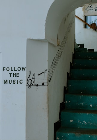 a set of stairs with a musical note painted on it