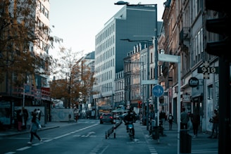 a city street filled with lots of tall buildings