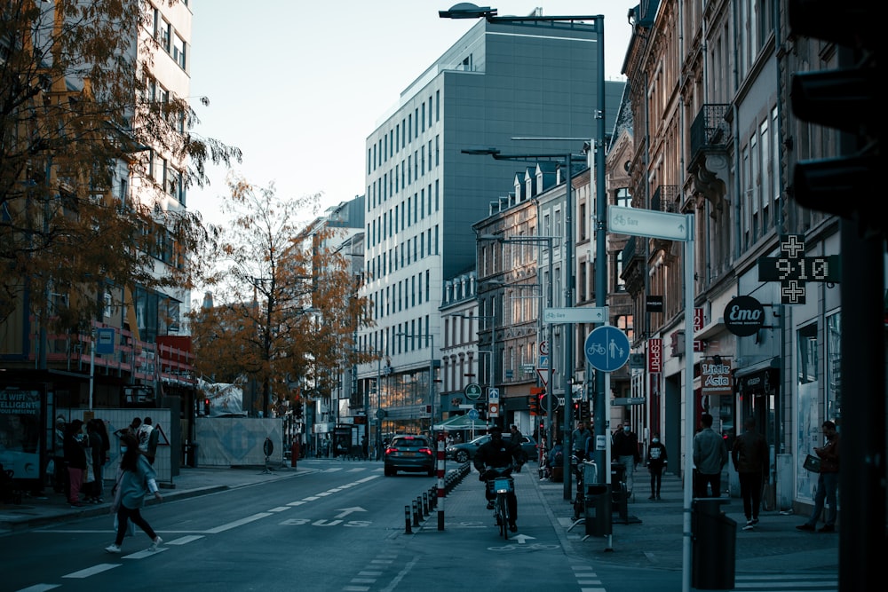 a city street filled with lots of tall buildings