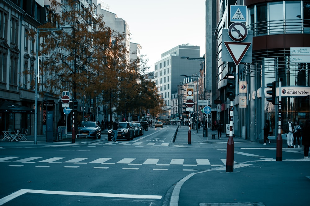 a city street filled with lots of tall buildings