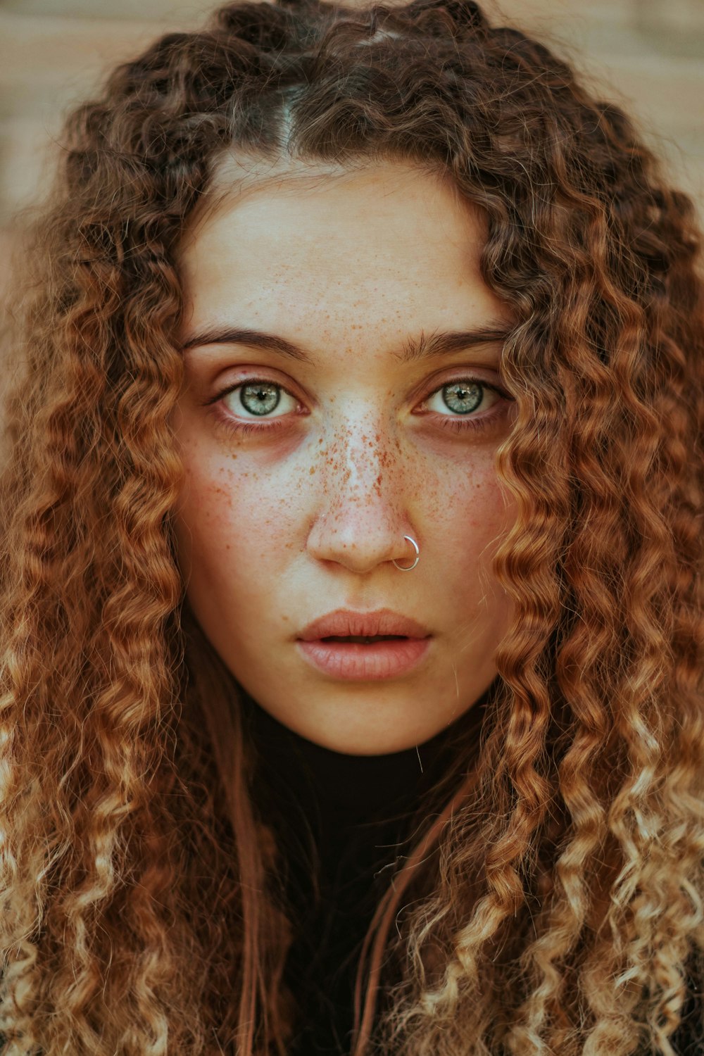 a woman with freckles and freckles on her face