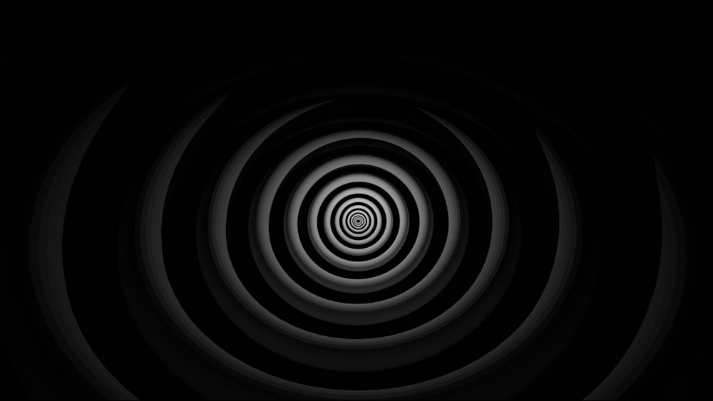 a black and white photo of a circular object