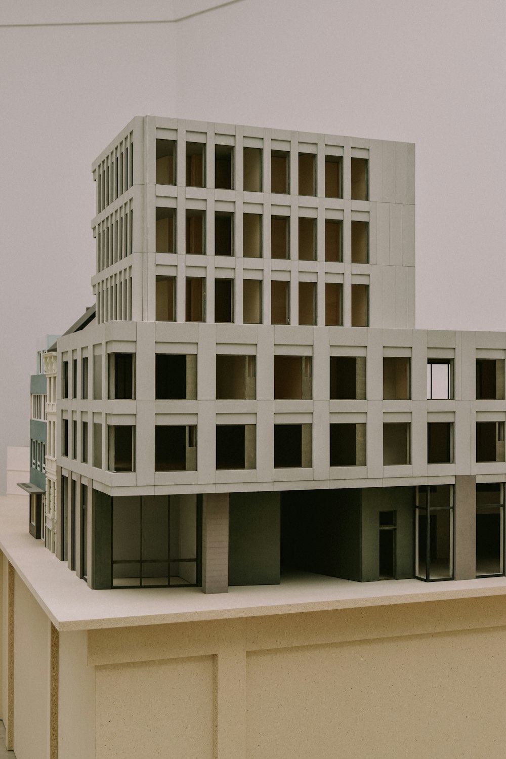 a model of a building sitting on top of a building