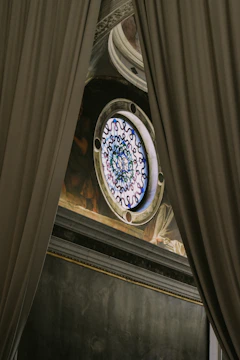 Close-up of restored stained glass window in a historic home.