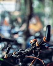 A sleek bicycle handlebar with elegant vaun accessories against a soft, inviting background.