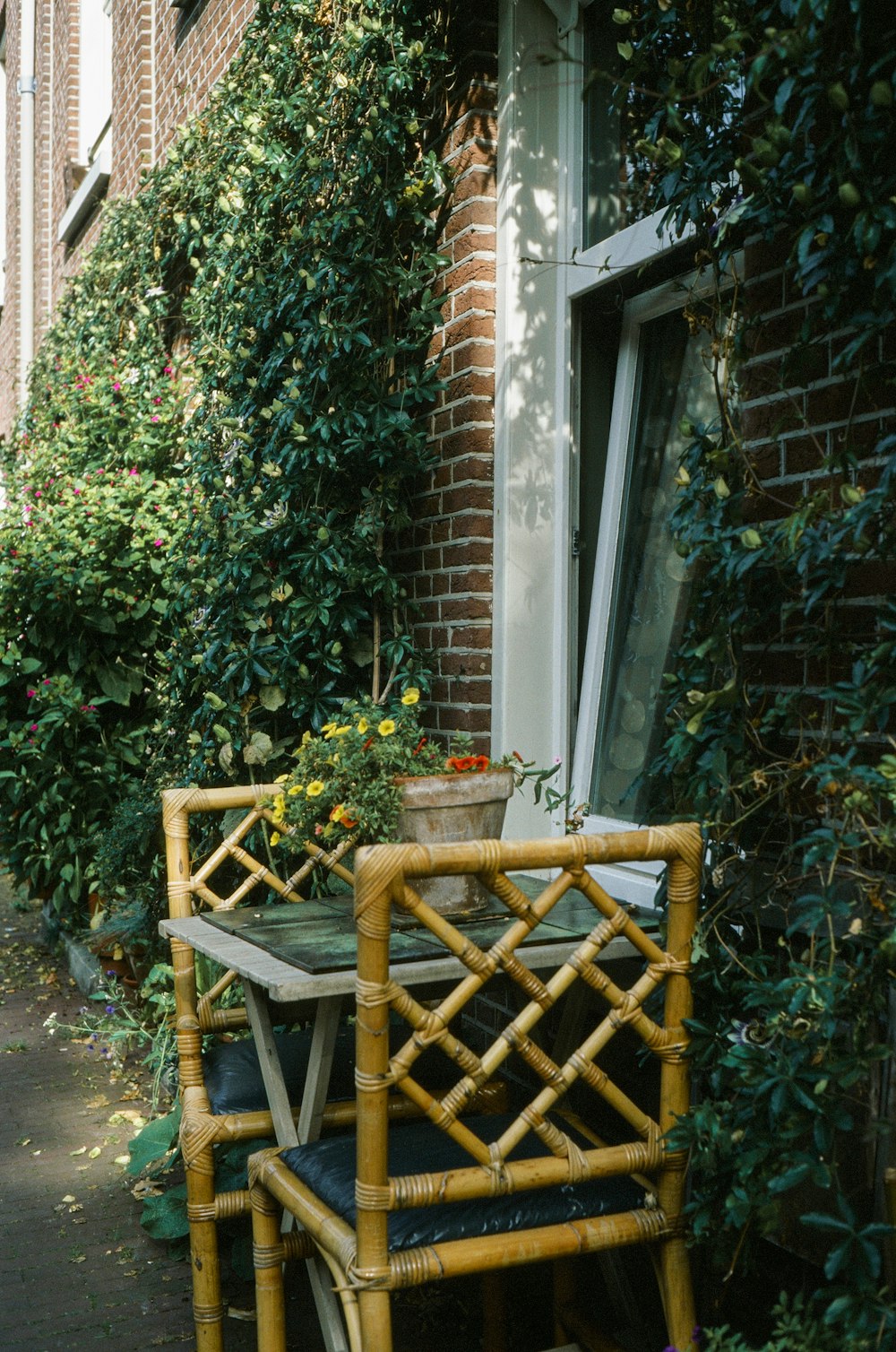 a chair and table in front of a building