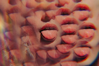 a close up of a person's lips and tongue