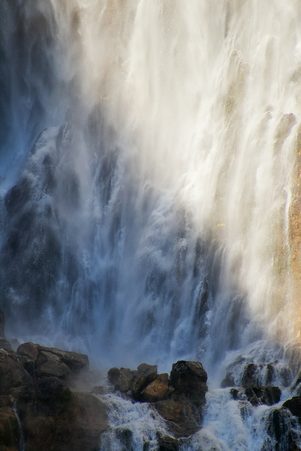 a large waterfall with lots of water coming out of it