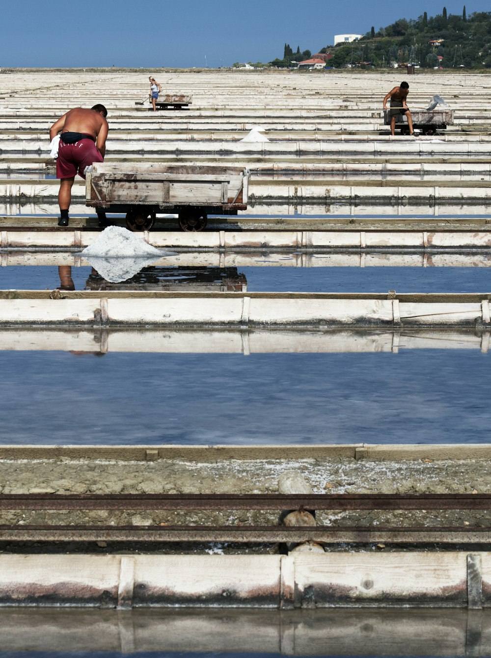 a man standing in a large pool of water