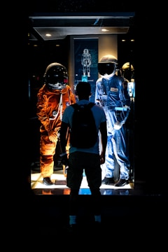 a group of people standing in front of a window
