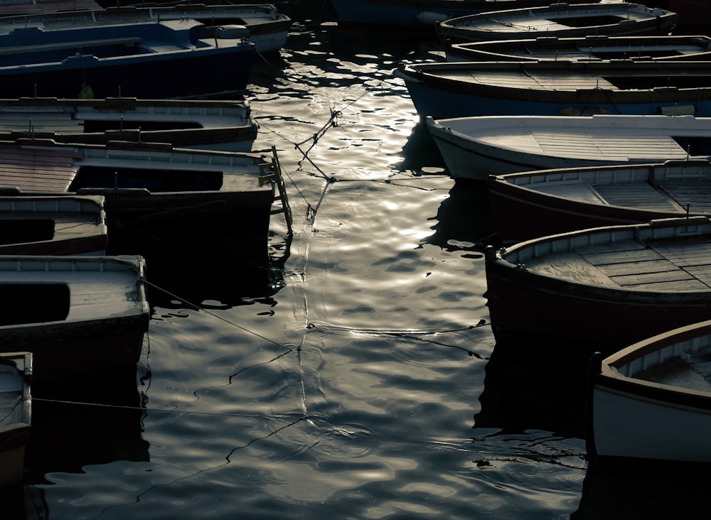 a bunch of boats that are sitting in the water