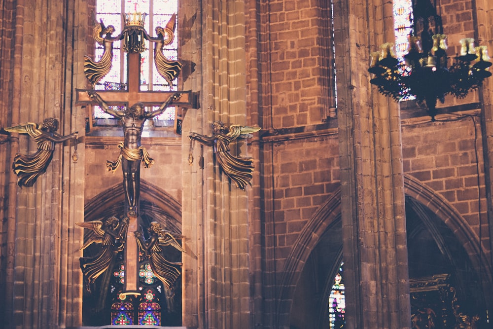 a church with a cross in the middle of it