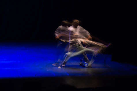 a couple of people that are standing on a stage